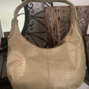 Champagne gold snakeskin bag.